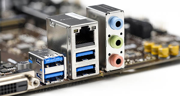 PCB board close-up showing RJ45 Ethernet connector, USB 3.0 interface, and 3.5mm audio jack port
