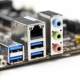 PCB board close-up showing RJ45 Ethernet connector, USB 3.0 interface, and 3.5mm audio jack port